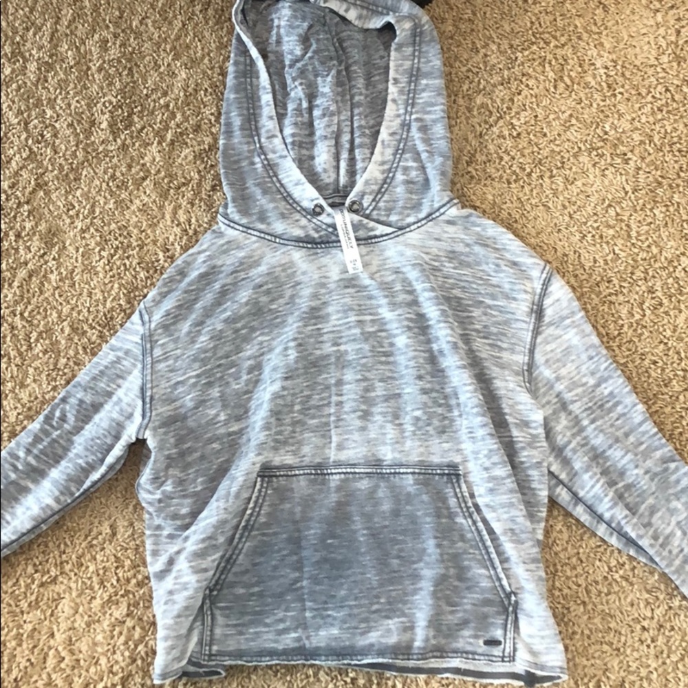 Light Lorna Jane hoodie in gray.